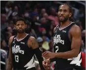  ?? HARRY HOW — GETTY IMAGES ?? With Kawhi Leonard, right, and Paul George in sync, the Clippers are in good position in the Western Conference.