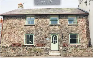  ??  ?? HOME FROM HOME: Owners Kate and David Howle enjoy breaks at their Old Smithy Cottage