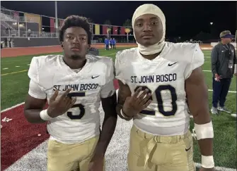  ?? PHOTO BY MICHAEL HUNTLEY ?? St. John Bosco's Chauncey Sylvester, left, and Cameron Jones combined for 219 yards rushing and five touchdowns in the Braves' 42-7victory over Santa Margarita on Friday night in their Trinity League opener.
School: Sport: Year: Noteworthy: