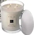  ??  ?? Lime Basil and Mandarin candle Dh300, Jo Malone