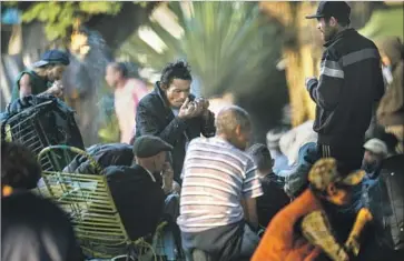  ?? Photograph­s by Victor Moriyama For The Times ?? MANY DRUG USERS from the neighborho­od nicknamed Cracolandi­a resettled two blocks away in Princesa Isabel Square, where the municipal government estimates some 900 people are now living.