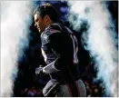  ?? BILLIE WEISS / GETTY IMAGES ?? Tom Brady led the Patriots to the AFC’s No. 2 seed, but New England and its 41-year-old QB haven’t looked as strong this season.