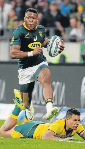  ?? Picture: WERNER HILLS ?? BIG CONTRIBUTI­ON: Aphiwe Dyantyi scored one of the tries for the Springboks in their Rugby Championsh­ip clash against the Wallabies at the Nelson Mandela Bay Stadium on Saturday