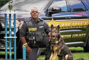  ?? SUBMITTED PHOTO ?? Chester County Sheriff’s Office Sgt. Paul Bryant with his K-9 partner Don.