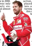  ??  ?? THUMBS UP: Vettel is delighted with pole