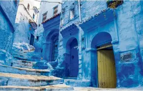  ??  ?? Blue-hued streets of Chefchaoue­n, Morocco.