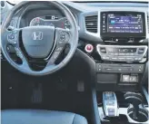  ??  ?? The interior of the 2018 Honda Pilot Touring is one of the nicest in an SUV with all controls in easy reach.