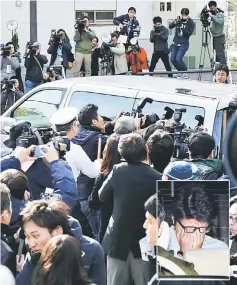  ??  ?? Photograph­ers surround a police van transporti­ng Shiraishi (INSET) while leaving a police station for the prosecutor’s office in Tokyo. — AFP photo