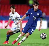  ??  ?? Euro star: Christian Pulisic, in action against Porto in midweek, is peaking at a fantastic time for Chelsea