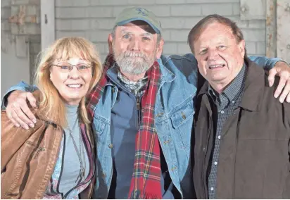  ?? MARK HOFFMAN/MILWAUKEE JOURNAL SENTINEL ?? Rise Hebebrand (left), Rick Pfeifer and Doug Henry are promoting a book about Wisconsin garage band Mourning Dayze, which has been performing since 1965. Pfeifer, an original member, has kept the band going. Henry, also an original member, left the...