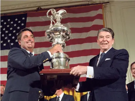  ?? PHOTO / BETTMAN ARCHIVE ?? Conner with President Ronald Reagan, celebratin­g the win at the White House.