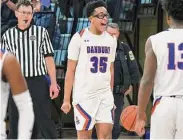  ?? Pete Paguaga/Hearst Connecticu­t Media ?? Danbury's Cameron Perkins celebrates after his team's win over Staples on Tuesday.