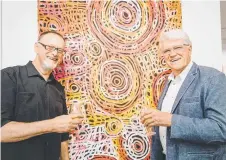  ??  ?? David Hinchliffe (left) celebrates the opening of his carefully curated indigenous art collection with his father Bruce Hinchliffe.