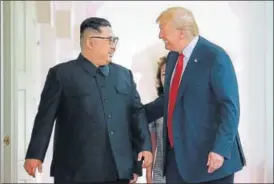  ?? AFP FILE ?? ▪ New BFFs? Kim Jong Un and Donald Trump share a laugh during their summit in Singapore.