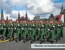  ?? ?? >
Russian servicemen parade