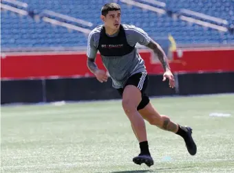  ?? PHOTO COURTESY OF NEW ENGLAND REVOLUTION ?? GETTING UP TO SPEED: Gustavo Bou, acquired last week by the Revolution, practices yesterday as the team prepares to host Vancouver tonight at Gillette Stadium.