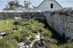  ?? ?? Rubbish bags and other detritus dumped in what was a horse kraal at the historic Ratelrivie­r homestead in the Agulhas National Park.