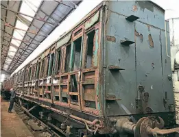  ?? ?? Maybe not a pretty sight at first glance, but coach No. 121 from the electrifie­d Altrincham branch is said to be in better condition than No. 117, which has just been externally restored to pristine condition. NICK DODSON