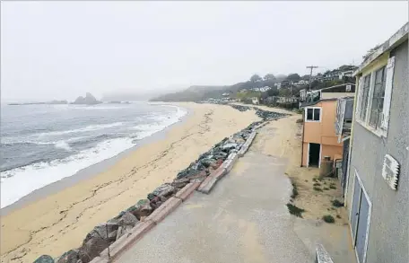  ?? Photograph­s by Allen J. Schaben Los Angeles Times ?? THE BATTLE over public access centers on whether Vinod Khosla has stopped visitors from entering a 49-acre parcel, which includes the access road and beach, and an additional 39.5 acres that contain coastal bluffs. Khosla bought Martin’s Beach for $32...