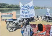  ?? TWITTER ?? Protesters with banners ‘Kejriwal Go back’ sitting on the main road leading to Bal Pabana village in Karnal on Saturday.