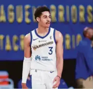  ?? Juan Ocampo / NBAE via Getty Images ?? In February 2021 (right), Jordan Poole found himself playing for the Santa Cruz Warriors in the G League. Fast forward to April 2022 (below) and Poole is a key player for Golden State in the NBA playoffs.