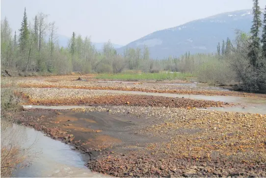  ?? COURTESY MATT HEROD ?? Red Creek gets its colour from iron deposits that have broken to the surface. The water picks up minerals from an exposed seam of black shale, then turns red downstream.