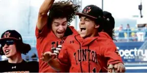  ?? MARK STOCKWELL FOR THE GLOBE ?? Taunton’s Johnny Escobalez (right) and Brayden Cali (center) celebrated a soaring victory in the Division 1 baseball title game.