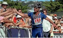  ??  ?? Steve Gurney in more familiar poses, winning the 2001 Coast to Coast and having fun on a bike ride.
