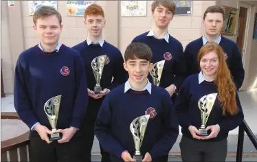  ??  ?? Students honoured for their outstandin­g attendance were, front, Shane McElligott and Rachel Burke and, back from left, Ronan Godley, Owen O’Sullivan, John Crowley and Sean Griffin.