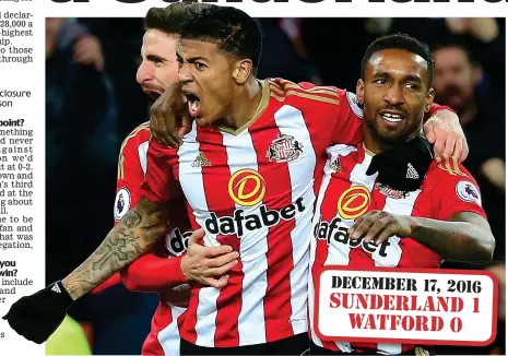  ?? GETTY IMAGES ?? Year ago: Jermain Defoe with scorer Patrick van Aanholt after his winner against Watford December 17, 2016 Sunderland 1 Watford 0