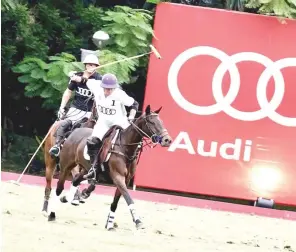  ?? CONTRIBUTE­D PHOTO ?? The Audi Whites batters the Audi Blacks during the recent 15th Enrique Zobel Memorial Polo Cup at the Manila Polo Club in Makati City.