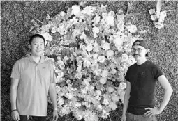  ?? Top:
JOE BURBANK/ORLANDO SENTINEL PHOTOS ?? Above: Michael Lee, left, owner of Shin Jung Korean BBQ, with sous chef Greg Moy, in front of an elaborate wall design of flowers in his newly rebuilt restaurant. The exterior of the newly rebuilt Shin Jung Korean BBQ.