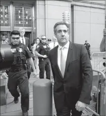  ?? CRAIG RUTTLE / ASSOCIATED PRESS ?? Michael Cohen, former personal lawyer to President Donald Trump, leaves federal court Tuesday after reaching a plea agreement.