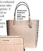  ??  ?? Embossed Madison tote, RM2,900, Coach