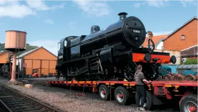  ?? BRIAN KENNEDY ?? Having been based in Somerset for its entire operationa­l career so far, ‘7F’ No. 53808 is winched onto a low-loader at Minehead on August 26 for its journey to Hampshire.