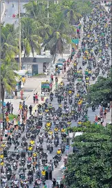  ?? AFP ?? Supporters of Brazil’s President Jair Bolsonaro take part in a motorcade rally along Copacabana beach in Rio de Janeiro.