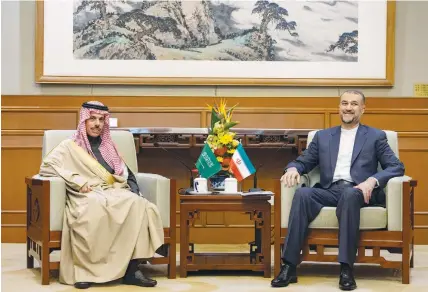  ?? (Saudi Press Agency/Reuters) ?? IRAN’S FOREIGN Minister Hossein Amir-Abdollahia­n meets with Saudi Foreign Minister Prince Faisal bin Farhan Al Saud in Beijing, last month.