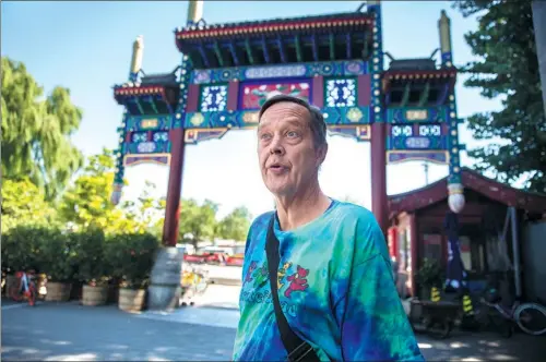  ?? YANG HAODONG / FOR CHINA DAILY ?? Terry Crossman patrols streets in Beijing’s Xicheng district as a public security volunteer.