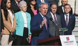  ?? ALEX WONG/GETTY ?? House Minority Leader Kevin McCarthy, center, said last month that “blank check” aid for Ukraine could change if fellow Republican­s take control of the chamber.