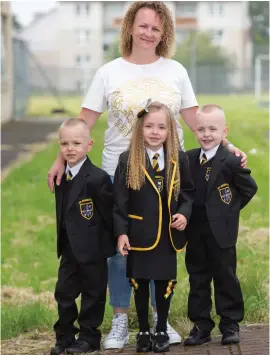  ?? Pictures: Robert Perry ?? Silas, Grace and Abel with mum Janet