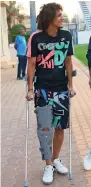  ??  ?? Omar at the Al Hilal club on crutches. — Picture courtesy Al Hilal Tweeter