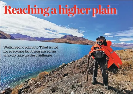  ?? PHOTOS PROVIDED TO CHINA DAILY ?? Fu Zihao enjoys the scenery at Yamdrok Lake in the Tibet autonomous region in 2019.