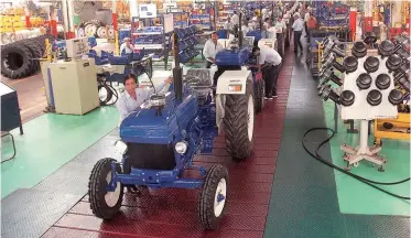  ??  ?? The company manufactur­ers 1,00,000 tractors a year