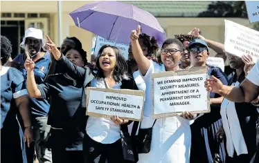  ?? Picture: WERNER HILLS ?? TAKING A STAND: Democratic Nursing Organisati­on of South Africa (DENOSA) members protested outside the District office of the Department of Health in Parsons Hil last month. Their concerns include the lack of safety at the workplace as well as the shortage of staff
