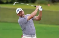  ?? The Associated Press ?? Lee Westwood, of England, hits a shot from the 16th fairway Saturday during the third round of the Arnold Palmer Invitation­al in Orlando, Fla.