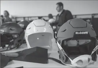  ?? TRIBUNE NEWS SERVICE ?? Riddell helmets in the research and developmen­t area at Riddell headquarte­rs in Des Plaines, Ill.