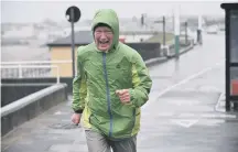  ??  ?? A jogger on Roker seafront yesterday.