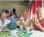  ?? Picture: FREDLIN ADRIAAN ?? TEA AND CAKE: Algoa Bay Council for the Aged members, from left, Marleen Nickels, Merle Davids and Core Skeepets enjoyed cupcakes and tea from Kerrygold SA’s social media company for Valentine’s Day