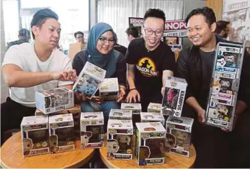  ?? FOTO: KHAIRUL AZHAR AHMAD ?? AHLI Kumpulan Pengumpul Funko Malaysia (dari kiri) Rayner, Farah Adila, Kenny Ang dan Mohd Taufiq Firdaus.