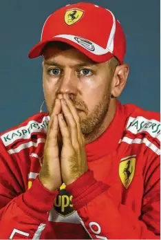  ?? Foto: dpa ?? Nachdenkli­ch zeigte sich zuletzt Sebastian Vettel, der trotz großen Rückstands auf Lewis Hamilton vor dem Lauf in Sotschi an seine WM-Chance glaubt.